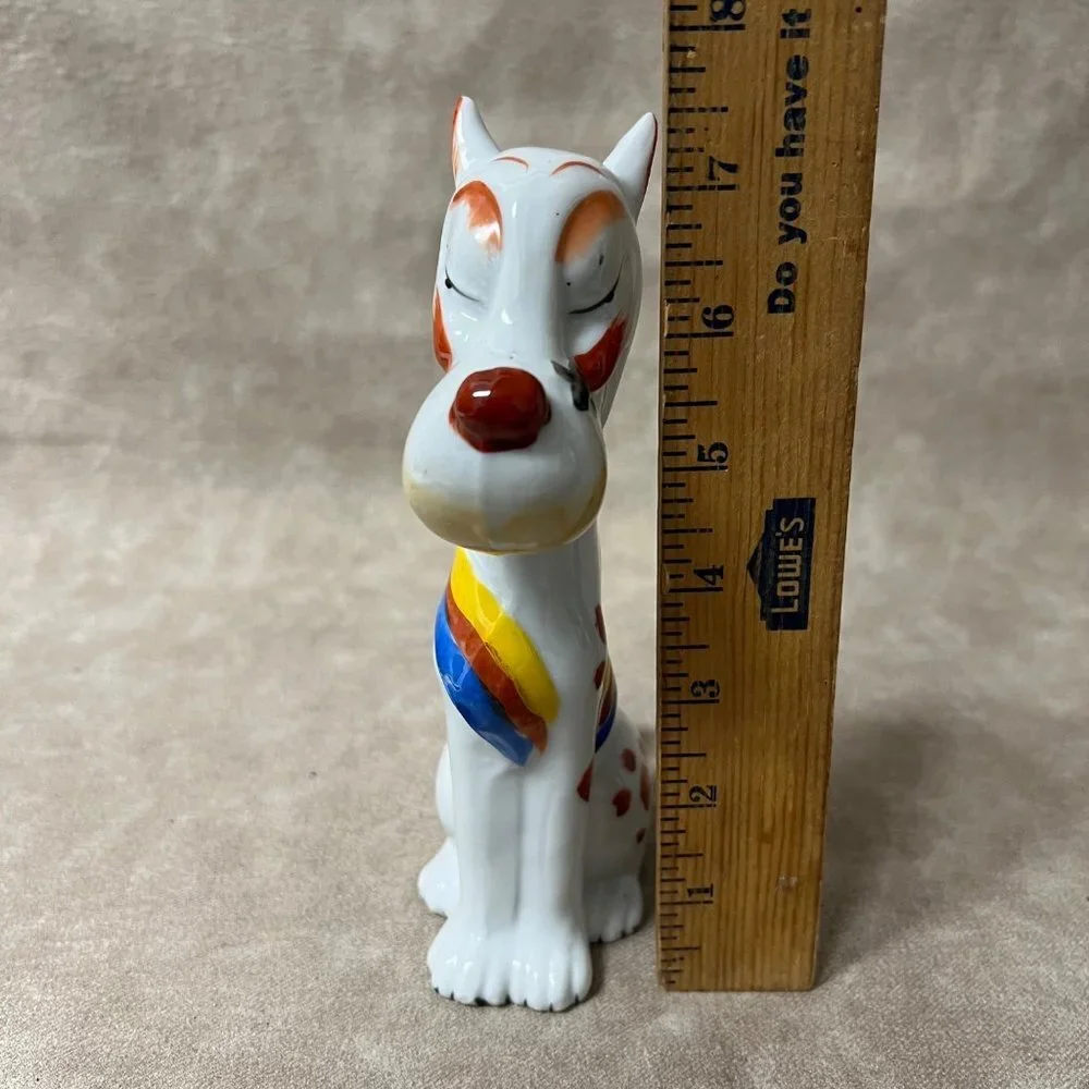 Vintage Dismal Desmond Japan Ceramic Dog Figurine.